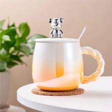 مج بورسلين الوان بغطاء دبدوب وملعقه