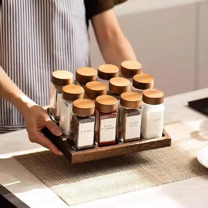 طقم بهارات ايكيا 12 حبه زجاج بغطاء خشبي +2 استيكر توابل وقلم