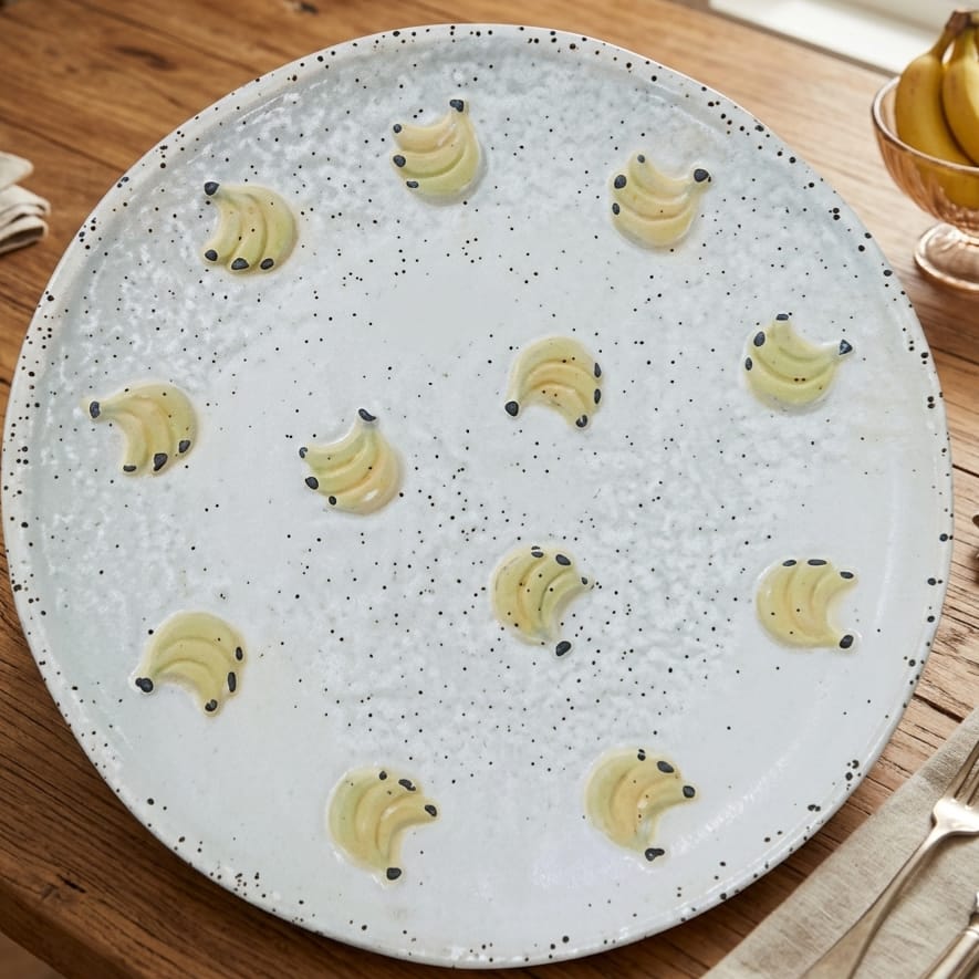 سيرفيس وطبق مدور بورسلين منقط مرسوم La banana